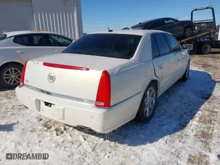 2006 Cadillac DTS w/1SC with VIN 1G6KD57Y86U102513, listed as a IAAI auction lot 41607409 with NaN miles. Bid and sale history available at carsss.com. Image 4.