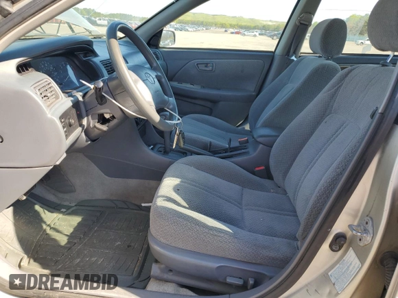 2000 Toyota Camry CE z VIN 4T1BG22K2YU711908, wystawiony jako Copart lot #56294515 z przebiegiem 110 871 mil mil oraz Szkoda całkowita • Salvage title. Historia ofert i sprzedaży dostępna na DreamBid. Obrazek 7.