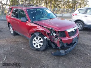 2008 Mazda Tribute Touring with VIN 4F2CZ96188KM14523, listed as a IAAI auction lot 41385257 with 197,453 mi miles. Bid and sale history available at carsss.com. Image 1.