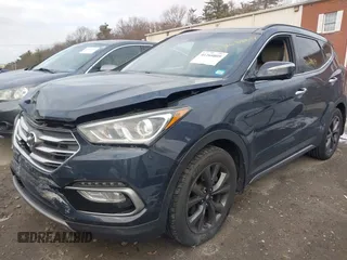 2017 Hyundai Santa Fe Ultimate with VIN 5NMZWDLA0HH045078, listed as a IAAI auction lot 41268809 with 100,659 mi miles and . Bid and sale history available at DreamBid. Image 17.
