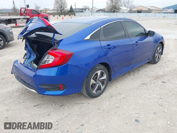 2020 Honda Civic LX with VIN 2HGFC2F69LH550744, listed as a IAAI auction lot 42079594 with 34,724 mi miles and . Bid and sale history available at DreamBid. Image 4.