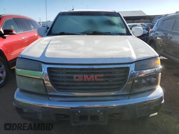 2011 GMC Canyon SLE1 with VIN 1GTH6MFE7B8121320, listed as a Copart auction lot 82718624 with 171,246 mi miles and Clean title. Bid and sale history available at DreamBid. Image 5.