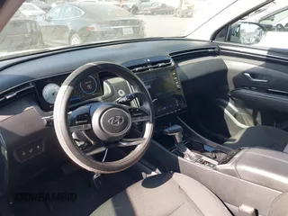 2022 Hyundai Tucson SEL z VIN 5NMJF3AE6NH133724, wystawiony jako IAAI lot #42309502 z przebiegiem 49 156 mil mil oraz . Historia ofert i sprzedaży dostępna na DreamBid. Obrazek 5.