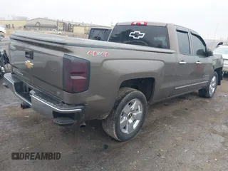 2015 Chevrolet Silverado 1500 LT with VIN 1GCVKREC9FZ237338, listed as a IAAI auction lot 41897225 with 154,229 mi miles and . Bid and sale history available at DreamBid. Image 4.