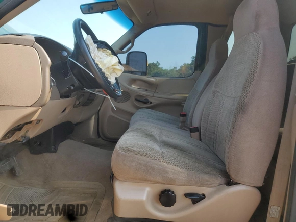 1998 Ford F-150 with VIN 1FTZX18W5WKA70902, listed as a Copart auction lot 59511105 with 193,944 mi miles and Salvage title. Bid and sale history available at DreamBid. Image 7.