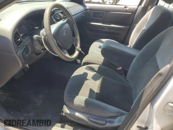 2005 Ford Taurus SE with VIN 1FAFP53U85A272630, listed as a Copart auction lot 61852075 with 196,108 mi miles and Clean title. Bid and sale history available at DreamBid. Image 7.