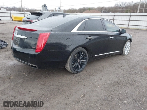 2014 Cadillac XTS Platinum with VIN 2G61W5S84E9291640, listed as a IAAI auction lot 41877867 with 100,462 mi miles and . Bid and sale history available at DreamBid. Image 4.