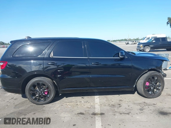 2020 Dodge Durango R/T with VIN 1C4SDHCT7LC285798, listed as a IAAI auction lot 42316447 with 86,344 mi miles and . Bid and sale history available at DreamBid. Image 14.