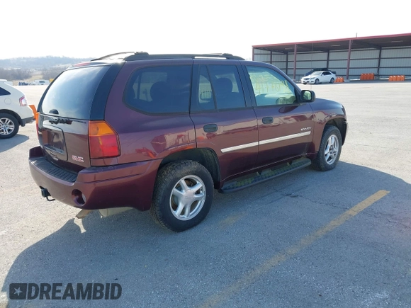 2006 GMC Envoy SLE z VIN 1GKDT13S762328884, wystawiony jako IAAI lot #41778198 z przebiegiem Nie podano mil oraz . Historia ofert i sprzedaży dostępna na DreamBid. Obrazek 4.