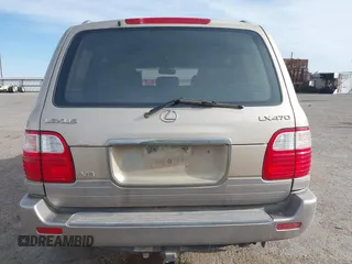 2000 Lexus LX 470 with VIN JT6HT00W0Y0098917, listed as a IAAI auction lot 41937661 with 180,980 mi miles and . Bid and sale history available at DreamBid. Image 16.