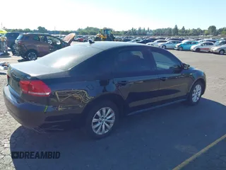 2014 Volkswagen Passat S with VIN 1VWAT7A33EC028875, listed as a IAAI auction lot 42762915 with 137,747 mi miles and . Bid and sale history available at DreamBid. Image 4.