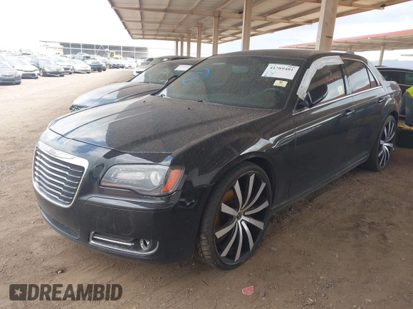 2012 Chrysler 300 S with VIN 2C3CCABGXCH313095, listed as a IAAI auction lot 41789401 with 186,302 mi miles and . Bid and sale history available at carsss.com. Image 2.