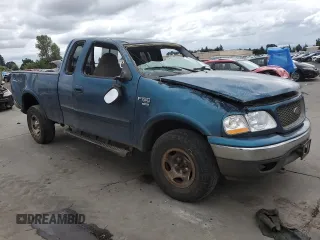 2001 Ford F-150 XL z VIN 1FTRX18W61NA24177, wystawiony jako Copart lot #60149714 z przebiegiem 192 297 mil mil oraz Szkoda całkowita • Salvage title. Historia ofert i sprzedaży dostępna na DreamBid. Obrazek 4.