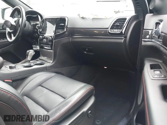 2021 Jeep Grand Cherokee Trailhawk with VIN 1C4RJFLT4MC771773, listed as a IAAI auction lot 42063954 with 17,920 mi miles and . Bid and sale history available at DreamBid. Image 5.