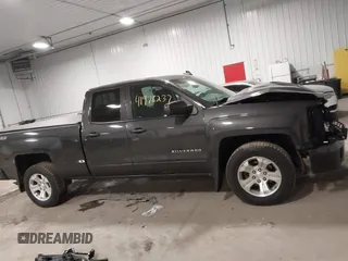 2016 Chevrolet Silverado 1500 LT with VIN 1GCVKREC0GZ303387, listed as a IAAI auction lot 41978237 with 123,692 mi miles and . Bid and sale history available at DreamBid. Image 13.