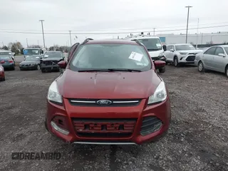 2016 Ford Escape SE with VIN 1FMCU9GX8GUB28820, listed as a IAAI auction lot 40874359 with 134,459 mi miles. Bid and sale history available at carsss.com. Image 12.