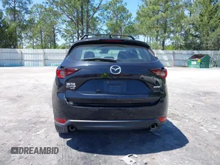 2018 Mazda CX-5 Sport with VIN JM3KFBBM4J0417018, listed as a IAAI auction lot 41984290 with 104,113 mi miles. Bid and sale history available at carsss.com. Image 17.