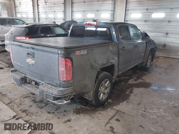 2019 Chevrolet Colorado 4WD Z71 z VIN 1GCGTDEN9K1299292, wystawiony jako IAAI lot #41626944 z przebiegiem 84 949 mil mil oraz . Historia ofert i sprzedaży dostępna na DreamBid. Obrazek 4.