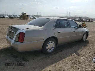 2001 Cadillac DeVille z VIN 1G6KD54YX1U242656, wystawiony jako Copart lot #54566105 z przebiegiem 200 016 mil mil oraz Szkoda całkowita • Salvage title. Historia ofert i sprzedaży dostępna na DreamBid. Obrazek 3.