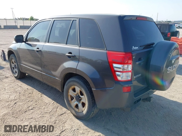 2012 Suzuki Grand Vitara Premium z VIN JS3TD0D22C4101455, wystawiony jako IAAI lot #42211776 z przebiegiem 153 569 mil mil oraz . Historia ofert i sprzedaży dostępna na DreamBid. Obrazek 3.
