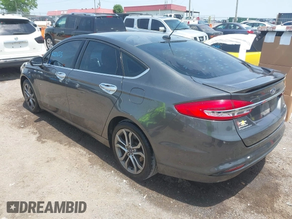 2017 Ford Fusion SE z VIN 3FA6P0HD3HR189144, wystawiony jako IAAI lot #42271155 z przebiegiem 172 146 mil mil oraz . Historia ofert i sprzedaży dostępna na DreamBid. Obrazek 3.