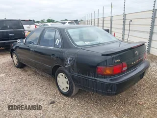 1996 Toyota Camry DX with VIN 4T1BG12K6TU754392, listed as a IAAI auction lot 42013697 with 172,410 mi miles. Bid and sale history available at carsss.com. Image 3.