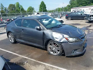 2011 Scion tC z VIN JTKJF5C75B3011644, wystawiony jako IAAI lot #42178185 z przebiegiem 108 187 mil mil oraz . Historia ofert i sprzedaży dostępna na DreamBid. Obrazek 13.