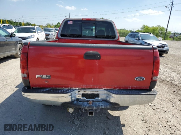 1998 Ford F-150 with VIN 1FTZX1765WKA88964, listed as a Copart auction lot 57334945 with 172,672 mi miles and Salvage title. Bid and sale history available at DreamBid. Image 6.