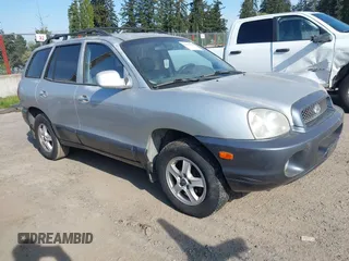 2002 Hyundai Santa Fe GLS with VIN KM8SC73D12U296838, listed as a IAAI auction lot 42117975 with 154,248 mi miles. Bid and sale history available at carsss.com. Image 1.