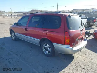 1999 Nissan Quest GXE with VIN 4N2XN11TXXD838700, listed as a IAAI auction lot 41867853 with 173,909 mi miles. Bid and sale history available at carsss.com. Image 3.