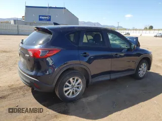 2016 Mazda CX-5 Touring z VIN JM3KE4CY8G0758947, wystawiony jako Copart lot #53140005 z przebiegiem 47 172 mil mil oraz Szkoda całkowita • Salvage title. Historia ofert i sprzedaży dostępna na DreamBid. Obrazek 3.
