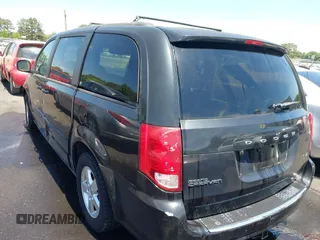 2012 Dodge Grand Caravan SXT with VIN 2C4RDGCG8CR247824, listed as a IAAI auction lot 42210397 with 200,919 mi miles and . Bid and sale history available at DreamBid. Image 3.