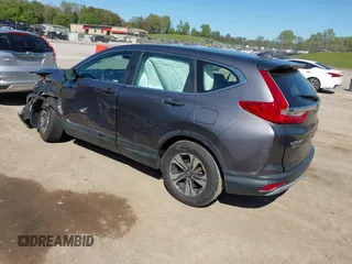 2019 Honda CR-V LX with VIN 2HKRW5H32KH410676, listed as a IAAI auction lot 42038654 with 94,342 mi miles. Bid and sale history available at carsss.com. Image 3.