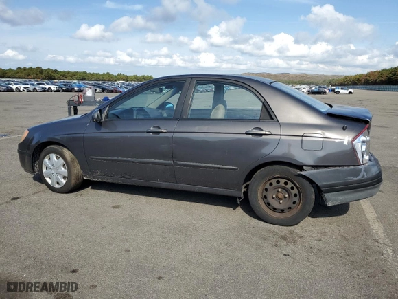 2006 Kia Spectra EX with VIN KNAFE122X65270684, listed as a Copart auction lot 73002454 with 79,326 mi miles and Salvage Title. Bid and sale history available at carsss.com. Image 2.
