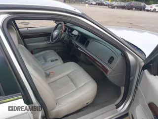 2003 Mercury Grand Marquis LS Premium z VIN 2MEFM75W03X658118, wystawiony jako IAAI lot #42435812 z przebiegiem 174 893 mil mil oraz . Historia ofert i sprzedaży dostępna na DreamBid. Obrazek 5.