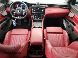 2023 Maserati Grecale Modena z VIN ZN682AVM0P7432182, wystawiony jako Copart lot #52376645 z przebiegiem 9 408 mil mil oraz Szkoda całkowita • Salvage title. Historia ofert i sprzedaży dostępna na DreamBid. Obrazek 8.