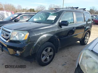 2011 Honda Pilot EX-L with VIN 5FNYF4H65BB053914, listed as a IAAI auction lot 41599171 with 230,186 mi miles and . Bid and sale history available at carsss.com. Image 17.