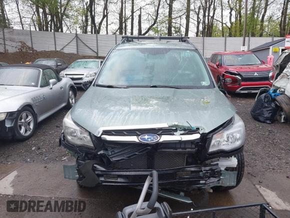 2017 Subaru Forester z VIN JF2SJABC4HH452602, wystawiony jako IAAI lot #42197639 z przebiegiem 141 385 mil mil oraz . Historia ofert i sprzedaży dostępna na DreamBid. Obrazek 13.
