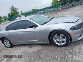 2015 Dodge Charger SXT with VIN 2C3CDXHG1FH886088, listed as a IAAI auction lot 42331369 with 119,659 mi miles and . Bid and sale history available at DreamBid. Image 13.