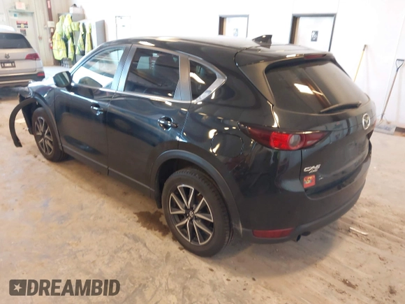 2018 Mazda CX-5 Touring with VIN JM3KFBCM9J0437490, listed as a IAAI auction lot 42006998 with 176,959 mi miles. Bid and sale history available at carsss.com. Image 3.