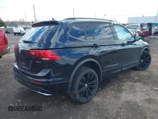 2021 Volkswagen Tiguan SE with VIN 3VV2B7AX1MM101432, listed as a IAAI auction lot 41982286 with 72,252 mi miles and . Bid and sale history available at DreamBid. Image 4.