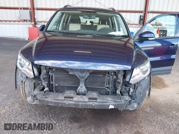2016 Volkswagen Tiguan S with VIN WVGAV7AX5GW584747, listed as a IAAI auction lot 41853488 with 92,579 mi miles and . Bid and sale history available at DreamBid. Image 6.