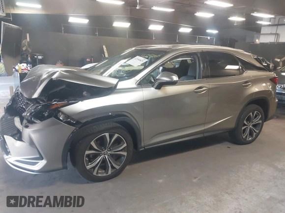 2020 Lexus RX 350 with VIN 2T2HZMDA0LC241565, listed as a IAAI auction lot 42556825 with 48,840 mi miles and . Bid and sale history available at DreamBid. Image 14.