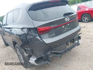2021 Hyundai Santa Fe SE with VIN 5NMS14AJ5MH346250, listed as a IAAI auction lot 42299607 with 50,643 mi miles and . Bid and sale history available at DreamBid. Image 22.