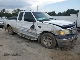 2002 Ford F-150 XL with VIN 1FTRX17L72NB60083, listed as a Copart auction lot 63627985 with Not provided miles and Salvage title. Bid and sale history available at DreamBid. Image 4.
