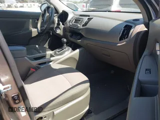 2011 Kia Sportage LX with VIN KNDPBCA20B7170217, listed as a IAAI auction lot 42303069 with 186,994 mi miles and . Bid and sale history available at DreamBid. Image 5.