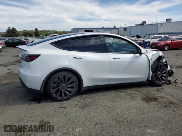 2022 Tesla Model Y Performance с VIN 7SAYGDEF2NF405596, выставлен на аукционе Copart как лот 52868195 с пробегом Не указан миль и Списание • Salvage title. История ставок и продаж доступна на DreamBid. Изображение 3.