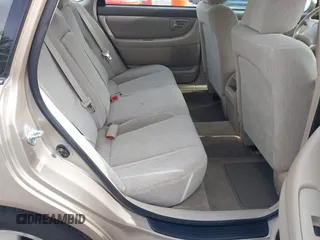 2000 Toyota Avalon XL with VIN 4T1BF28BXYU070808, listed as a IAAI auction lot 42061893 with 228,229 mi miles and . Bid and sale history available at DreamBid. Image 8.