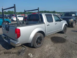 2006 Nissan Frontier LE z VIN 1N6AD07W66C434429, wystawiony jako IAAI lot #42819815 z przebiegiem 130 644 mil mil oraz . Historia ofert i sprzedaży dostępna na DreamBid. Obrazek 4.