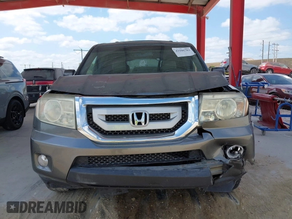 2011 Honda Pilot EX-L z VIN 5FNYF4H61BB040660, wystawiony jako IAAI lot #42106783 z przebiegiem 247 869 mil mil oraz . Historia ofert i sprzedaży dostępna na DreamBid. Obrazek 6.